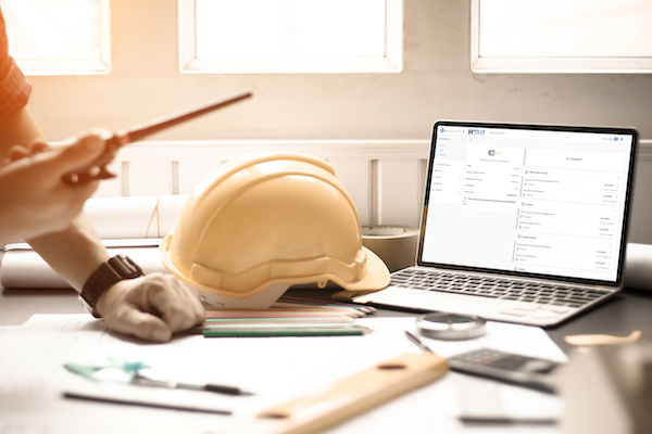 Safety manager reviewing construction subcontractor credentials